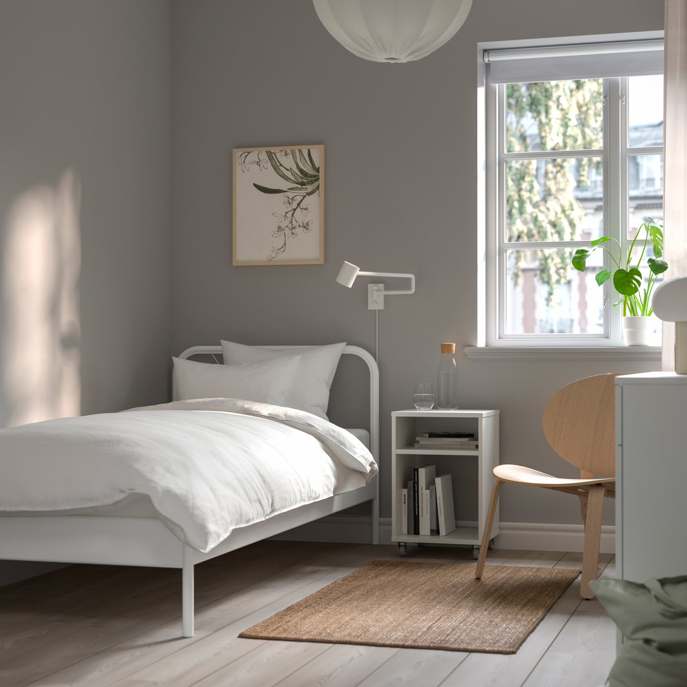 A white NESTTUN bed frame