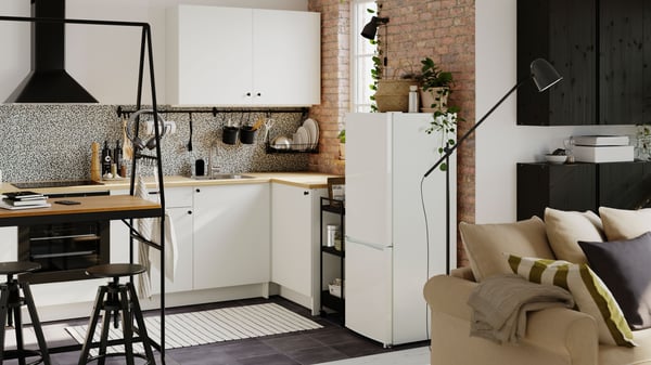 A black SKURUP floor/reading lamp