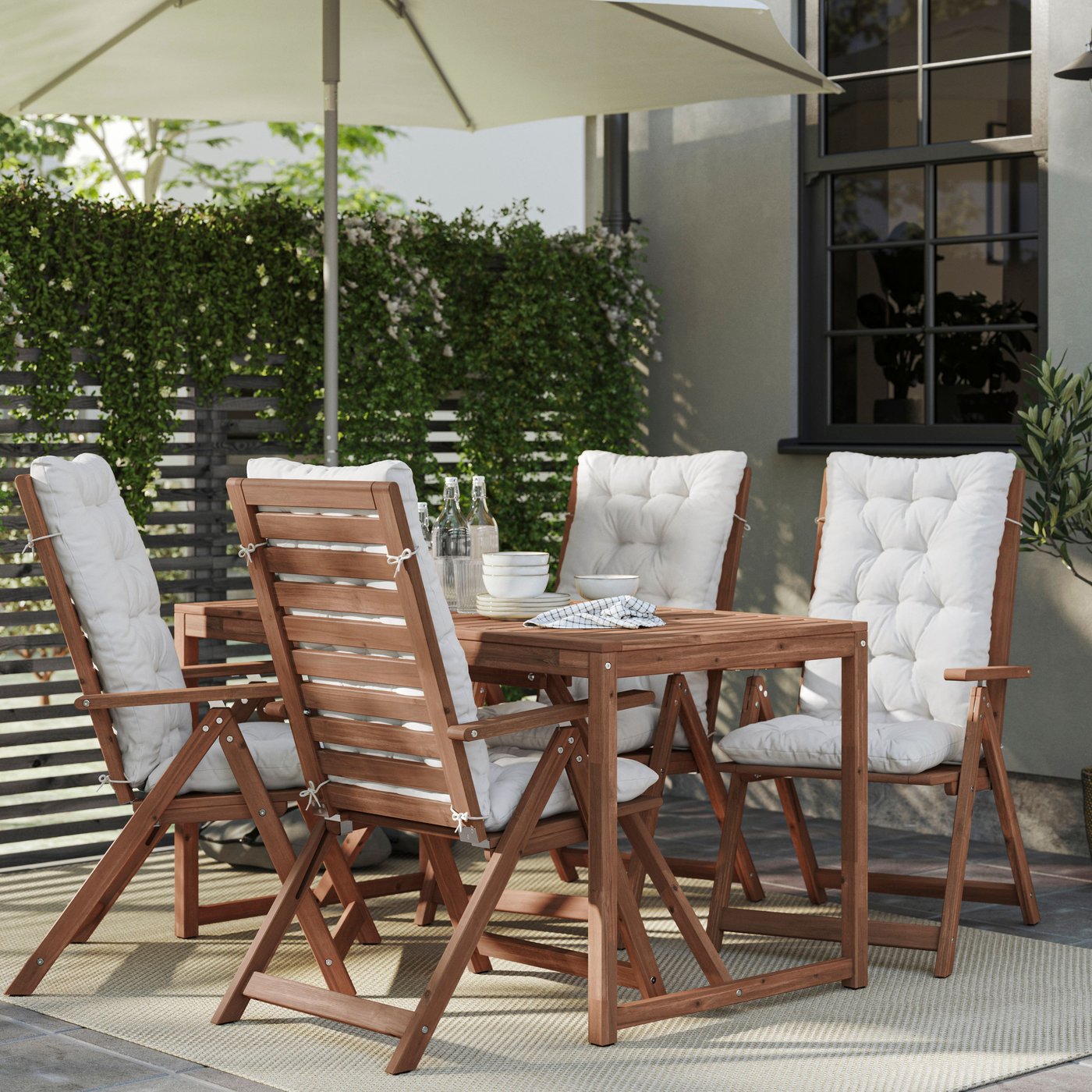 A light brown stained NÄMMARÖ table, outdoor