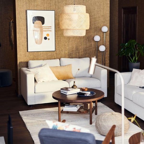 A beige RÖDASK cushion cover in the living room