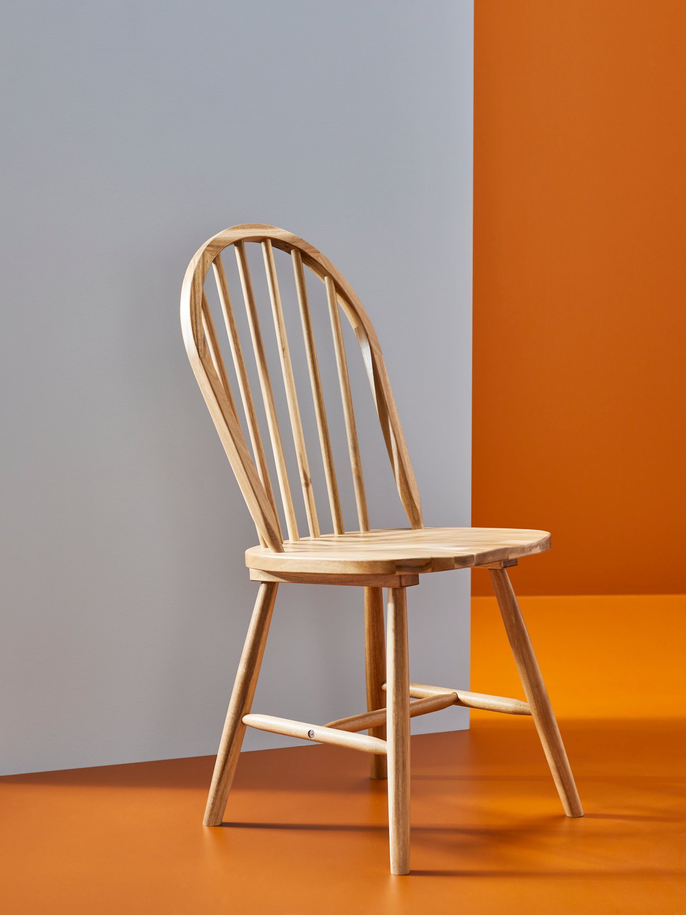 An acacia SKOGSTA chair
