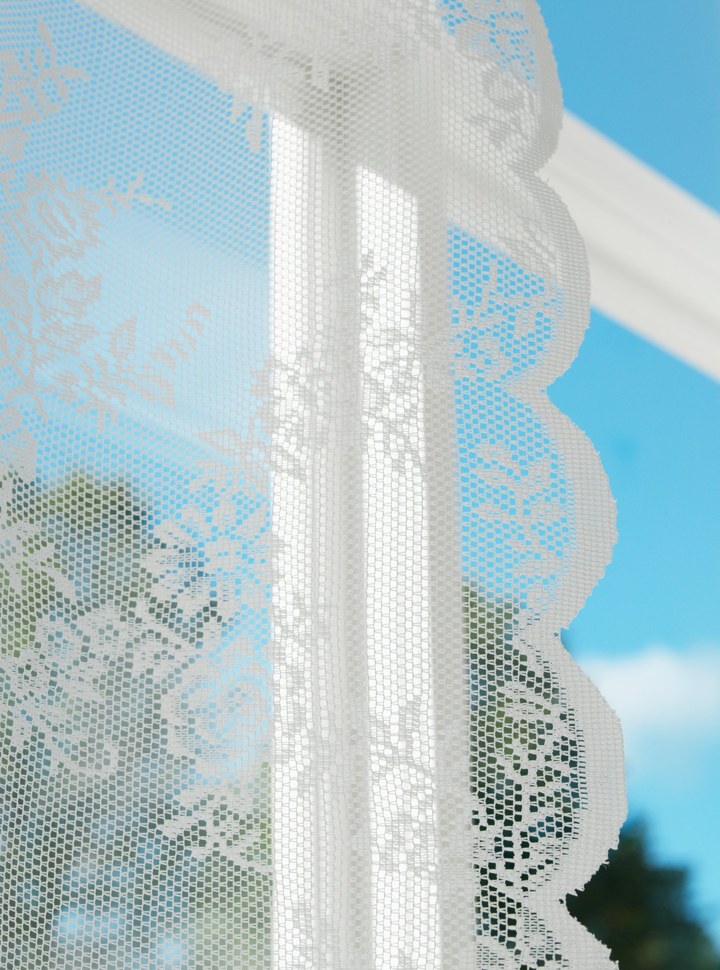 An off-white/with rod pocket ALVINE SPETS net curtains, 1 pair