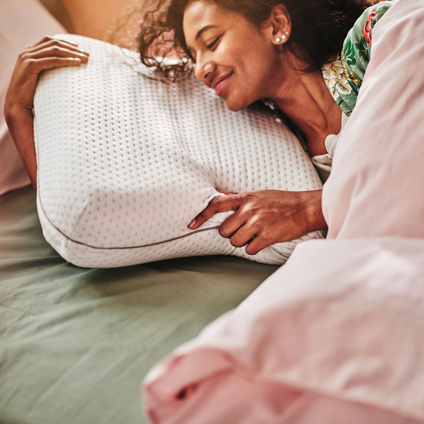 An ISRANUNKEL ergonomic pillow, multi position