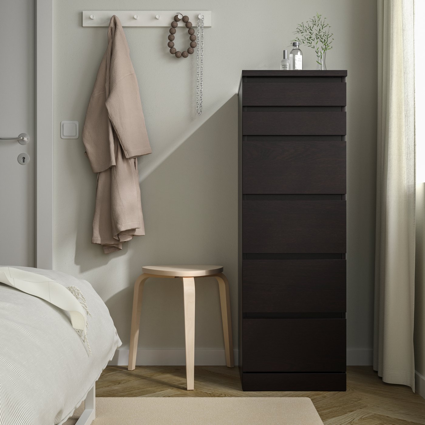 A black-brown/mirror glass MALM chest of 6 drawers in the bedroom