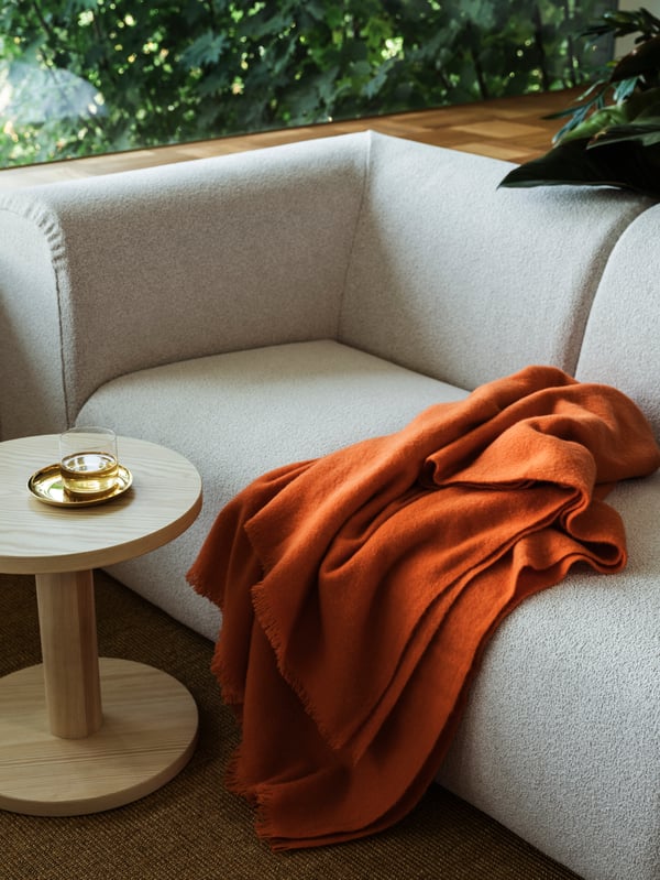 A brass-colour STOCKHOLM 2025 bowl and dish in the living room