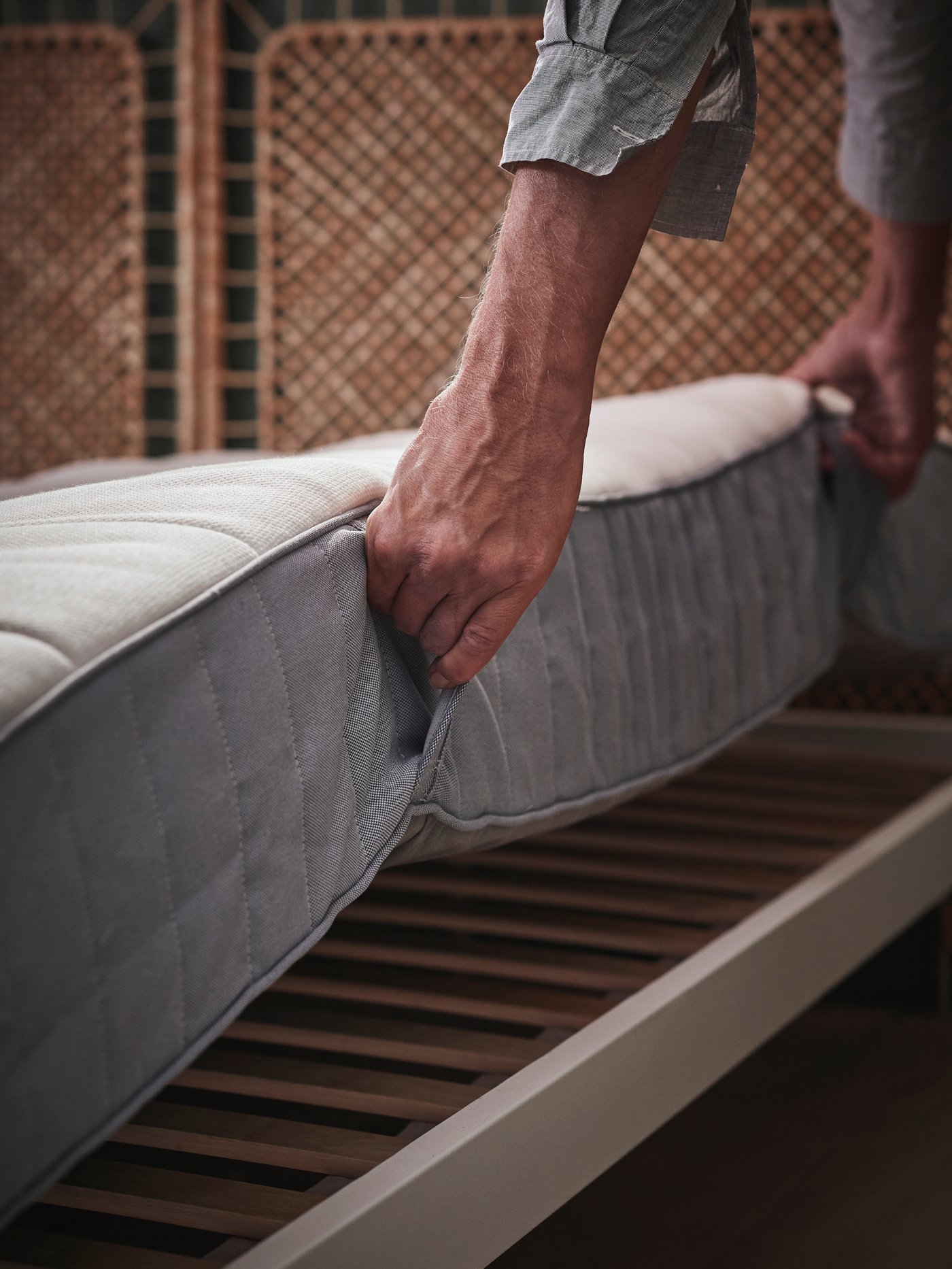 A firm/light blue VALEVÅG pocket sprung mattress