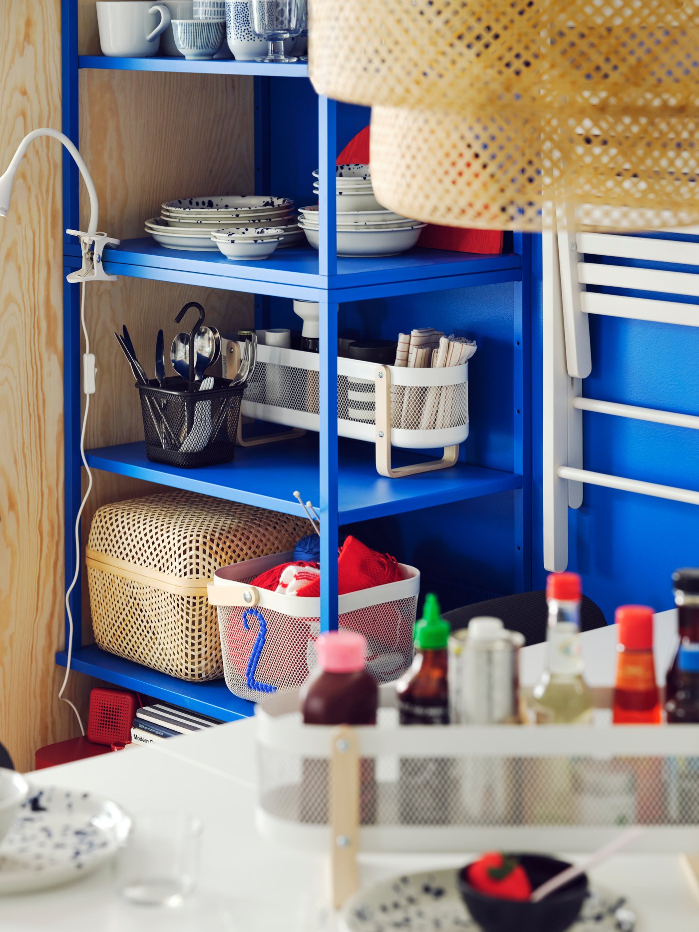 A white RISATORP basket with compartments