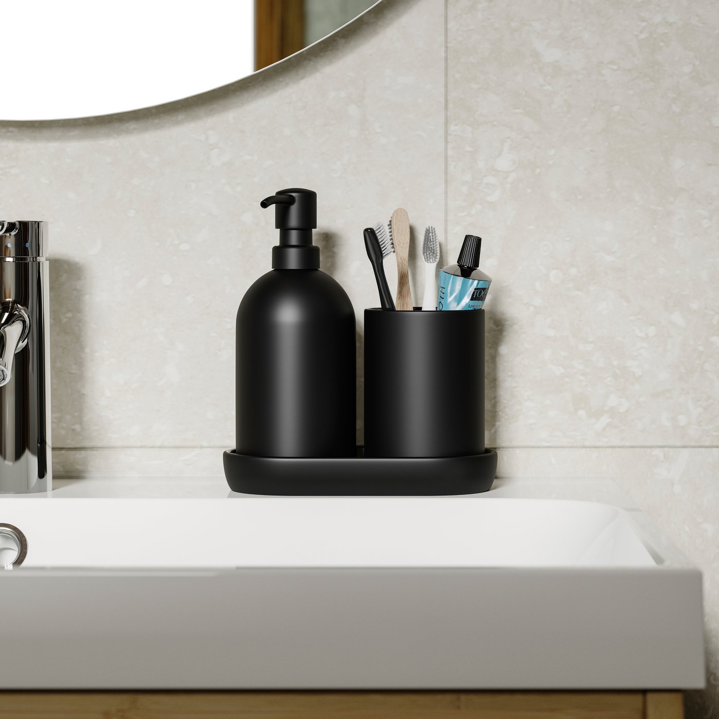 A black GANSJÖN 3-piece bathroom set