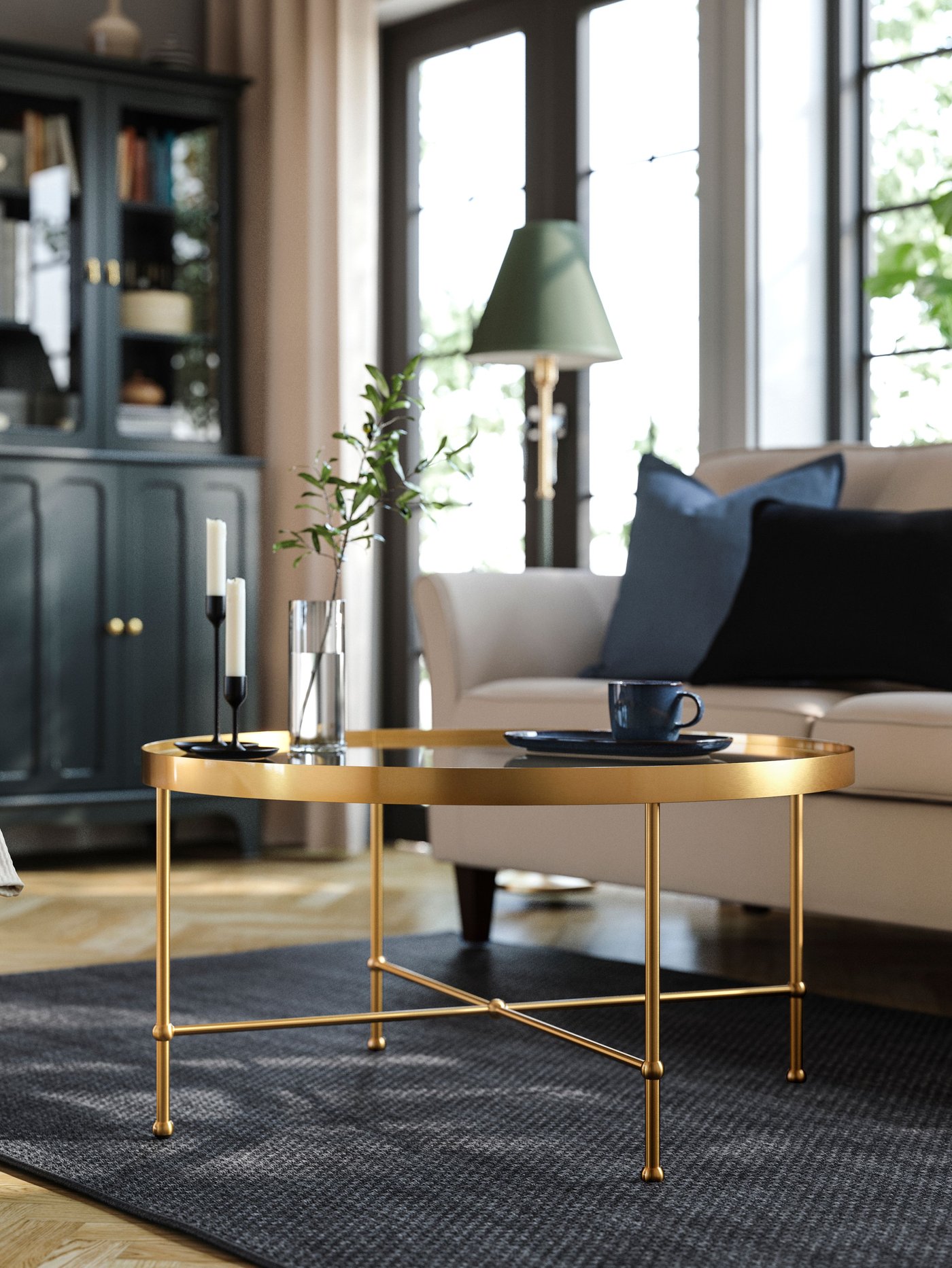 A gold effect/glass TORSJÖ coffee table in the living room for Deepavali