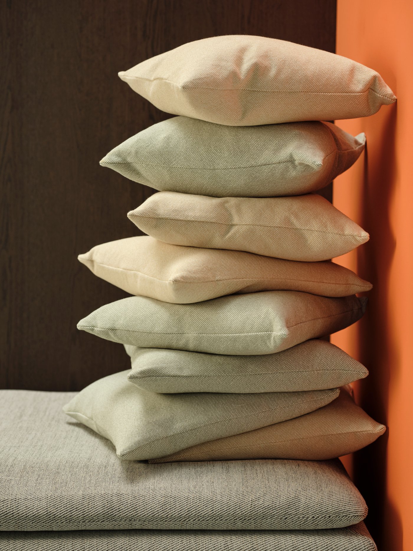 A grey-green/white SANDTRAV cushion