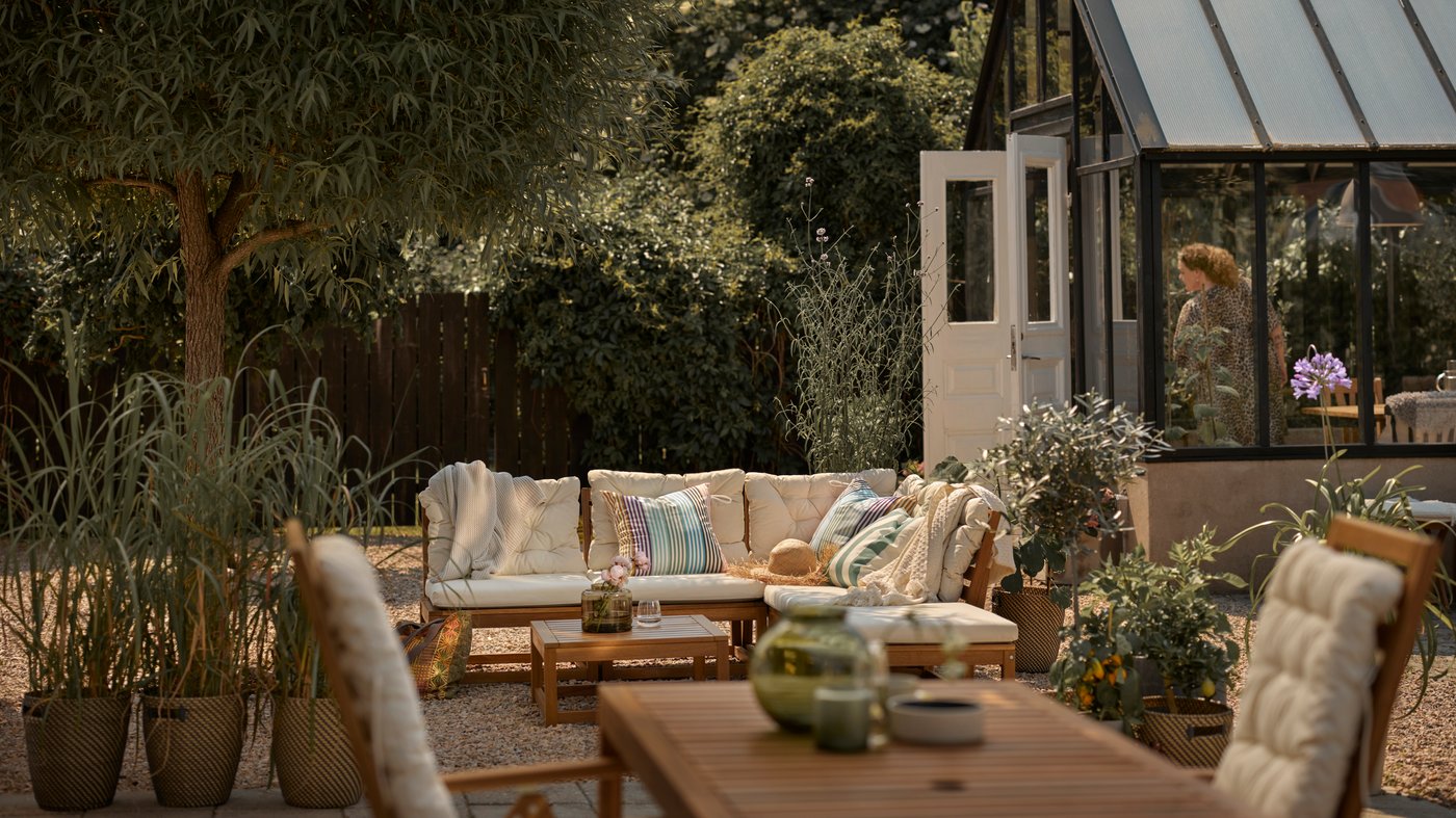 A light brown stained NÄMMARÖ seat sec for modular sofa, outdoor