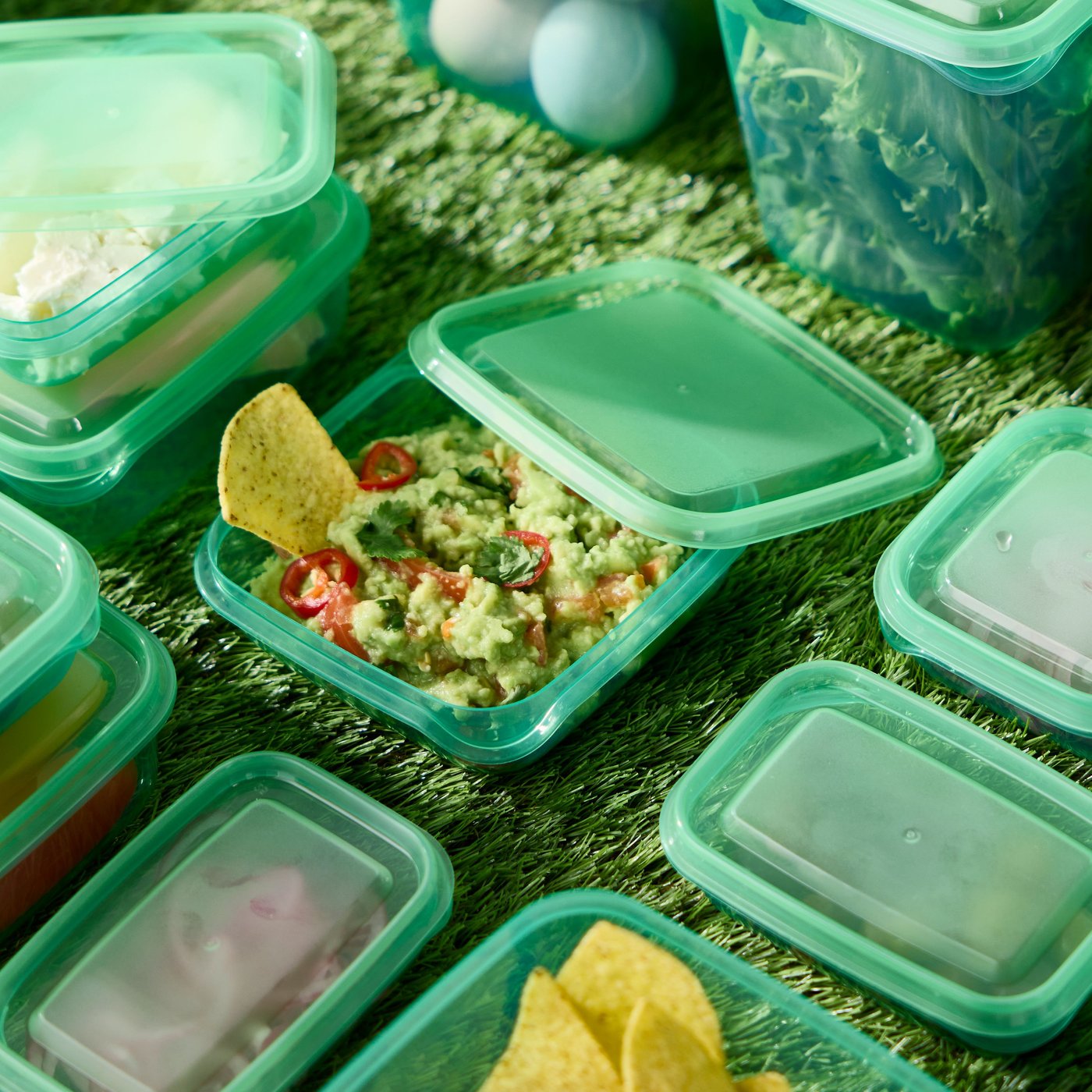 A green PRUTA food container with lid in the NA