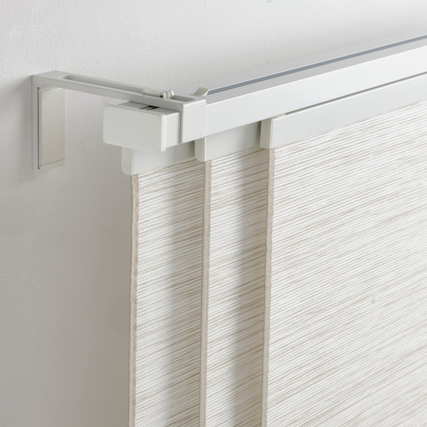 An included ceiling fittings/white VIDGA triple track rail