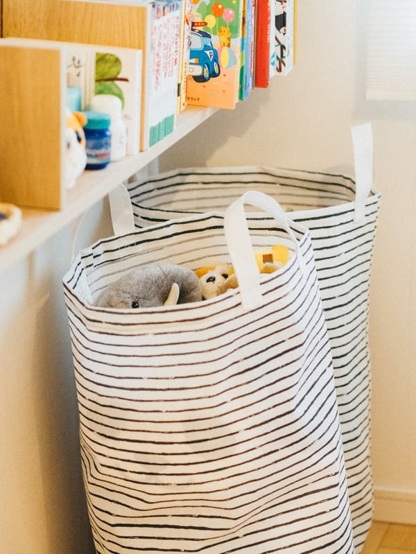 A white/black KLUNKA laundry bag