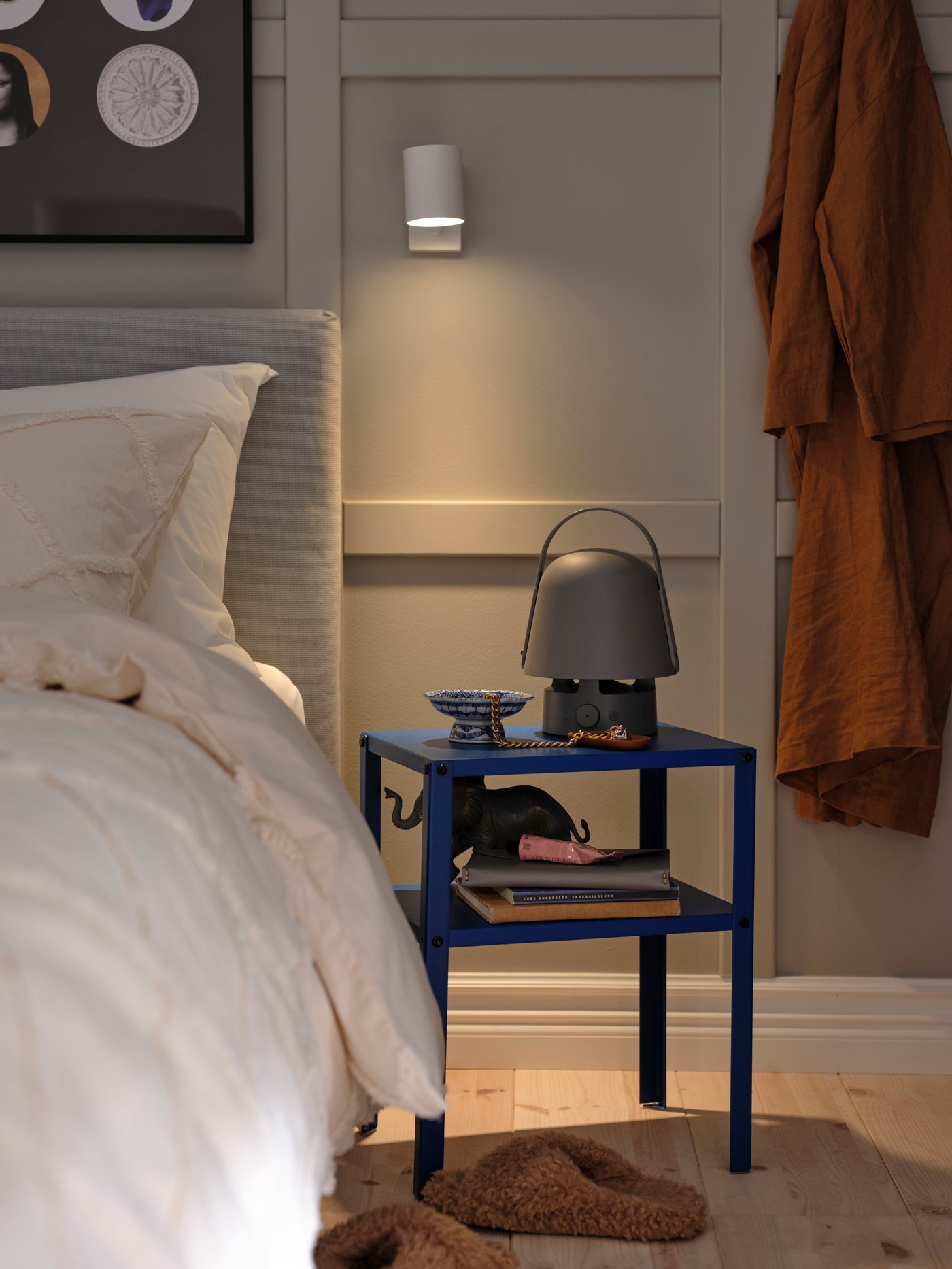 An outdoor/grey VAPPEBY bluetooth speaker lamp in the bedroom