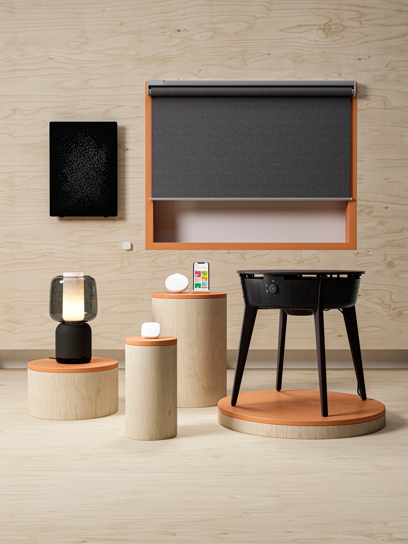 Modern interior featuring a gray roller shade, minimalist furniture, a table lamp, and decorative elements on circular stands.