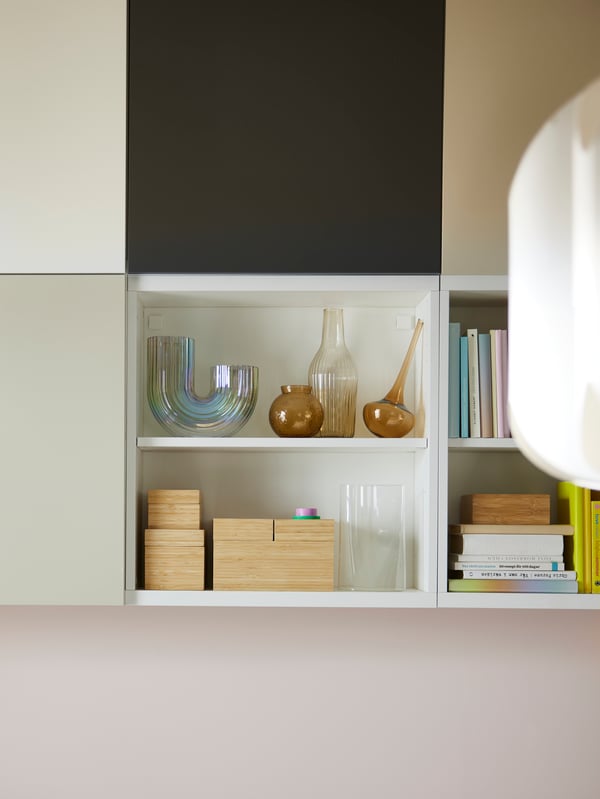 Six BESTÅ frames. Two of the frames show objects on the shelves, and four have LAPPVIKEN doors in various colours on them.