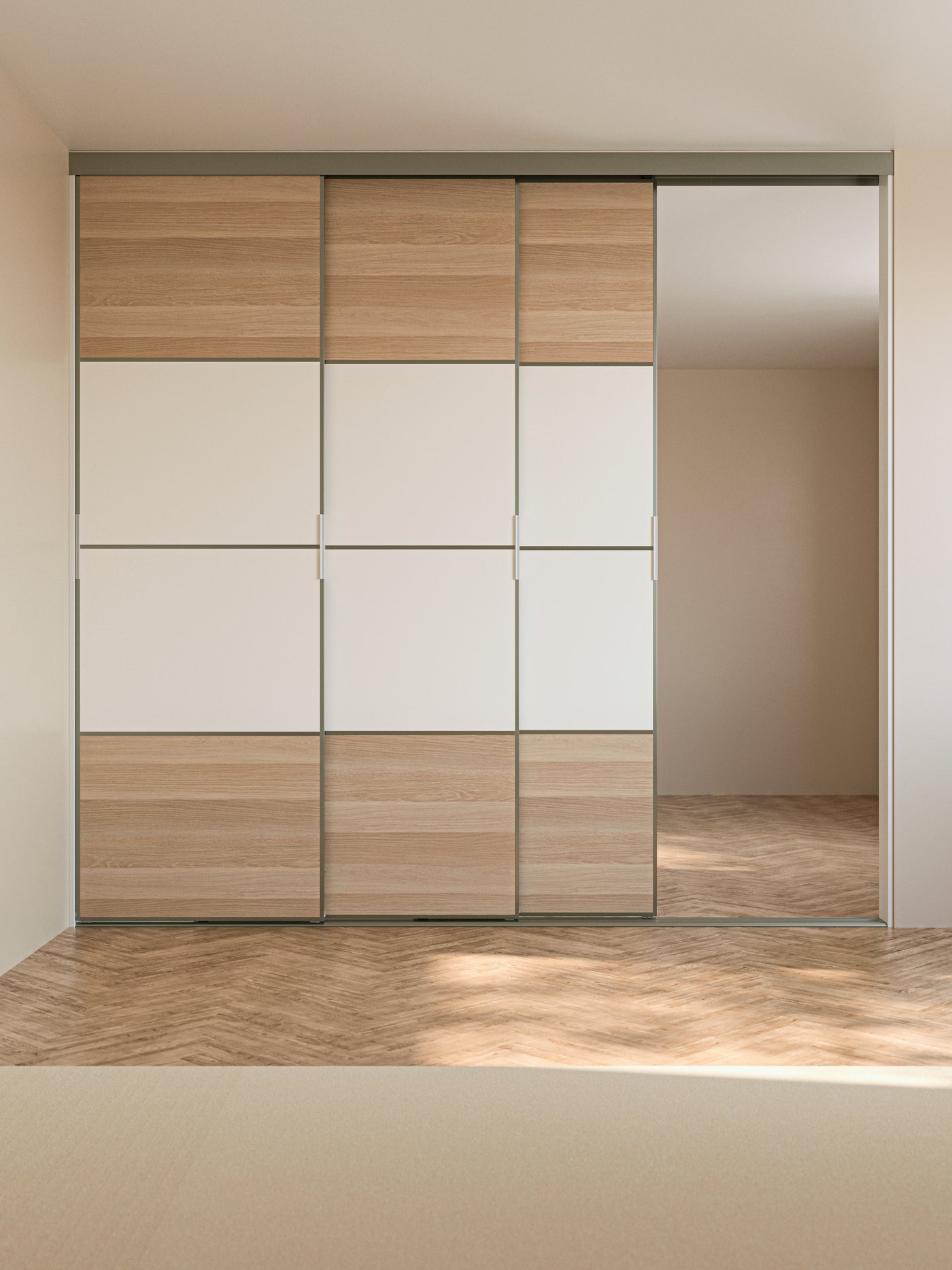 A SKYTTA sliding door solution with high door frames and white stained oak effect/white MEHAMN panels for sliding door frame.
