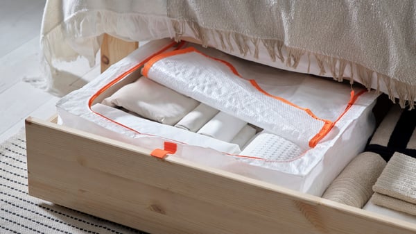 A PÄRKLA storage case in the bedroom