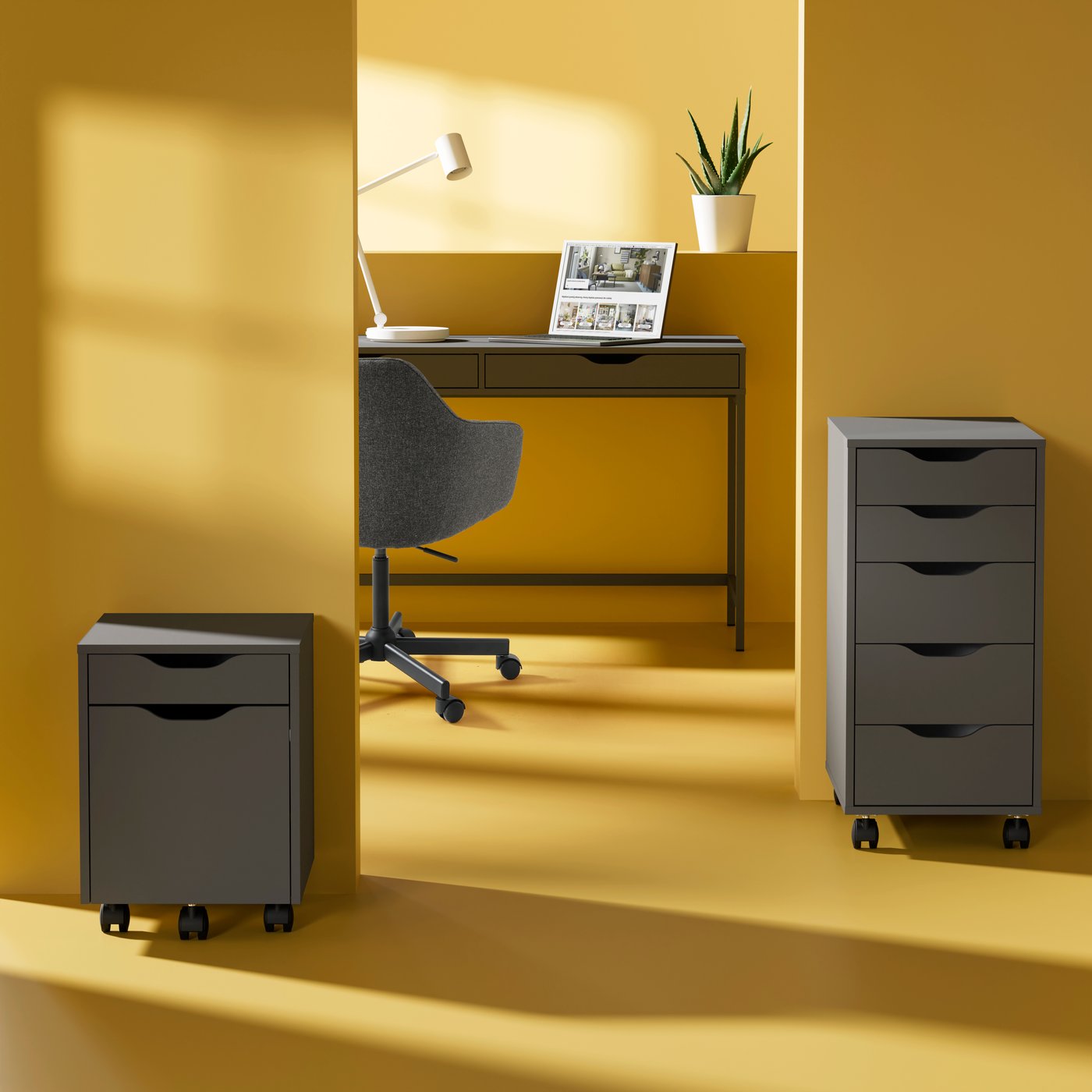 A dark grey/black ALEX drawer unit on castors