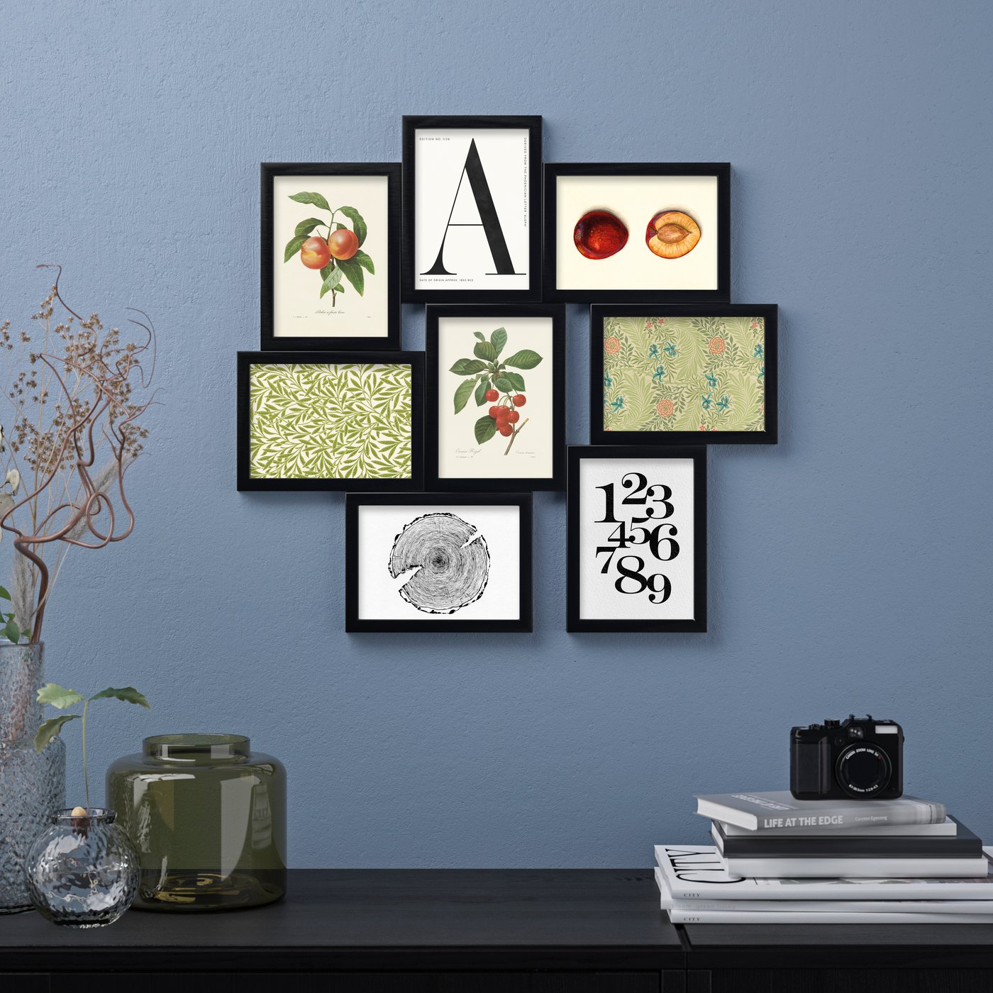 A black VÄXBO collage frame for 8 photos