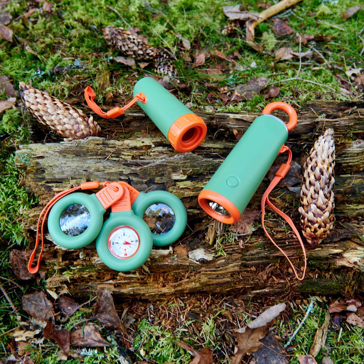 A green/orange MAJBAGGE monocular
