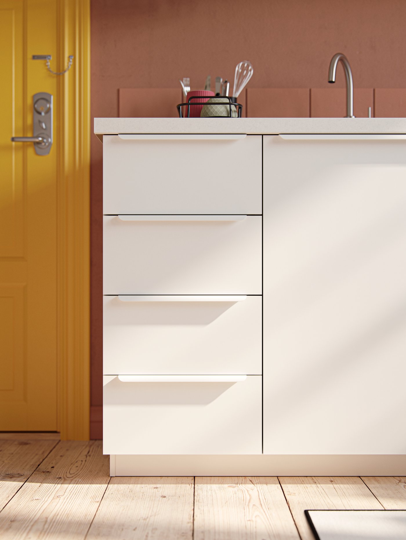 A white BILLSBRO handle in the kitchen