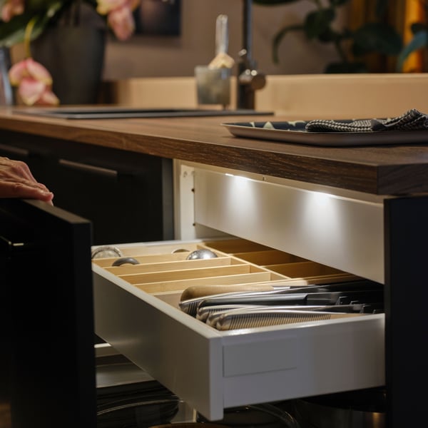A brown walnut effect/laminate EKBACKEN worktop