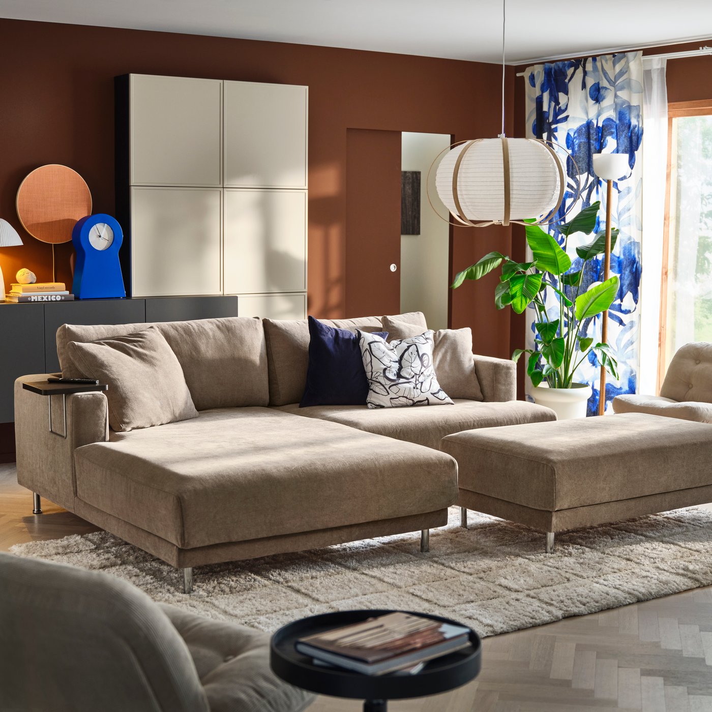 A dark blue SANELA cushion cover in the living room