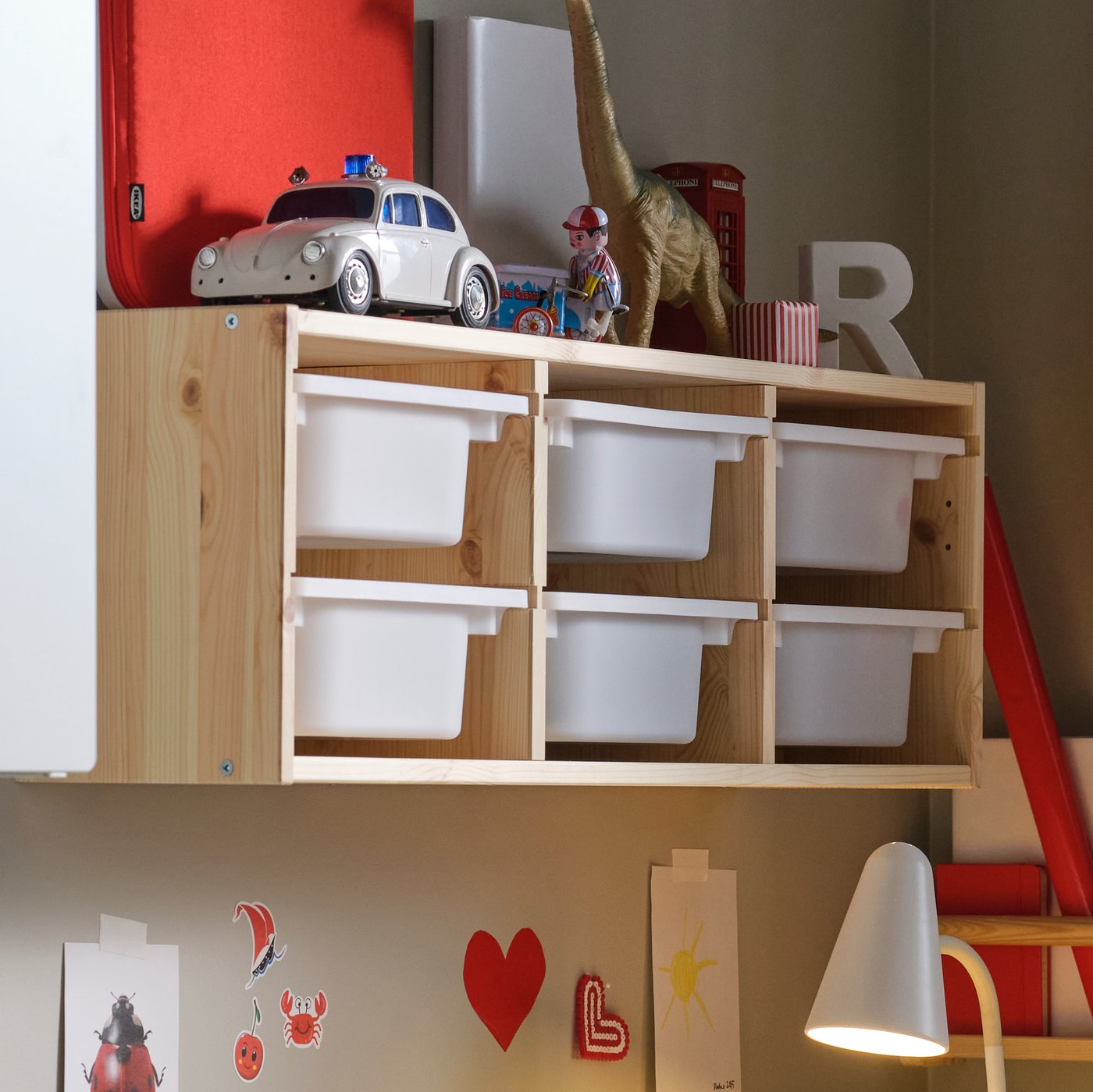 A light white stained pine/white TROFAST wall storage