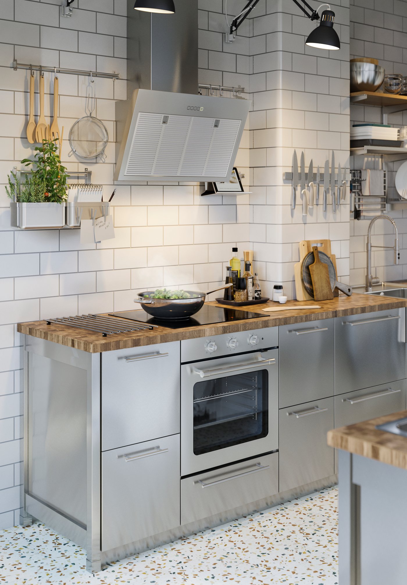 An IKEA 300 stainless steel MATTRADITION forced air oven in the kitchen