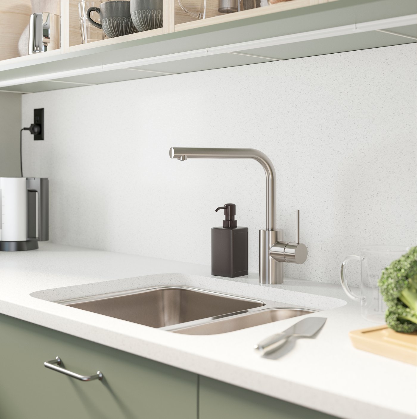 A grey RINNIG soap dispenser in the kitchen