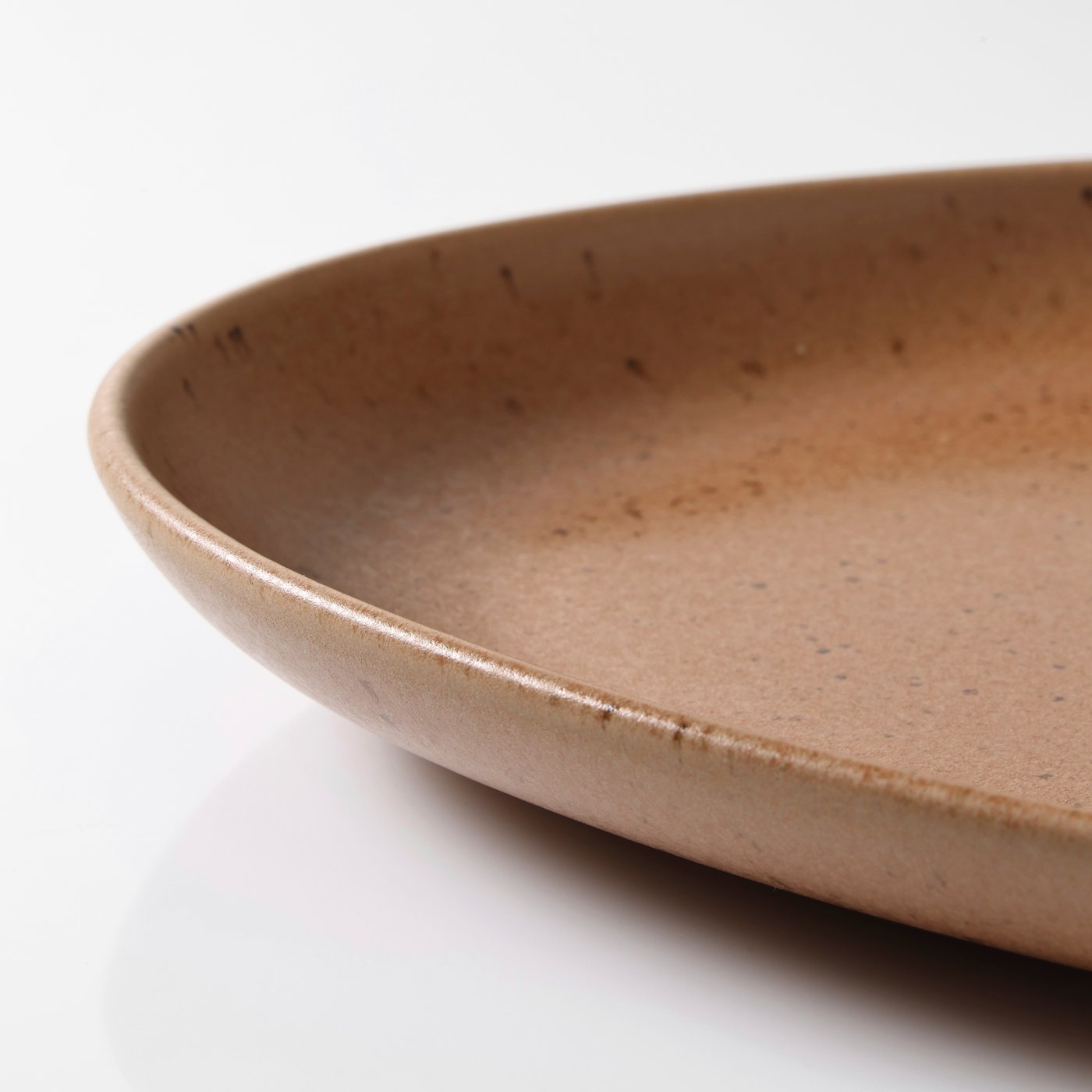 A medium brown GRÅRÄV serving plate
