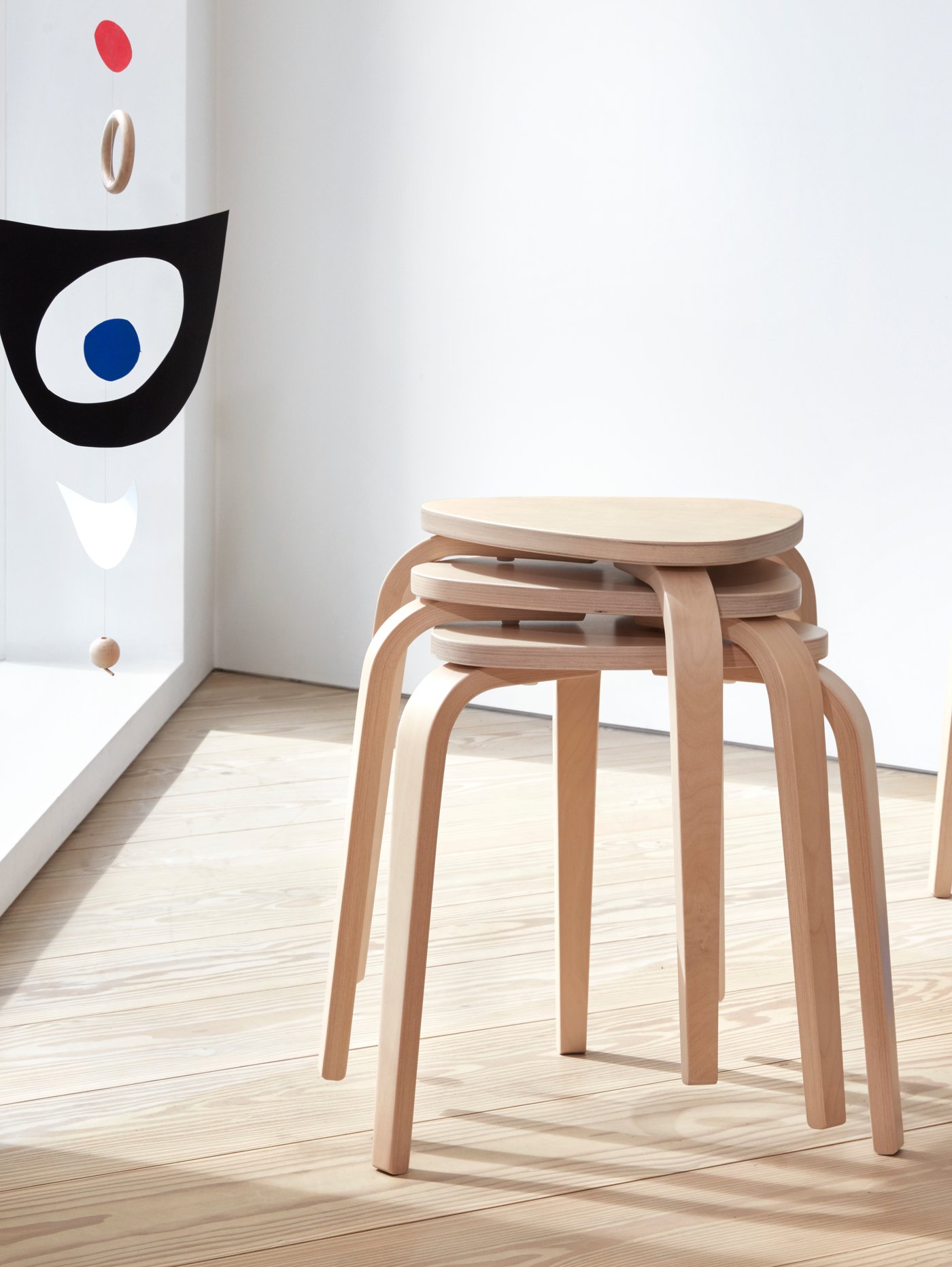 A birch KYRRE stool in the dining room