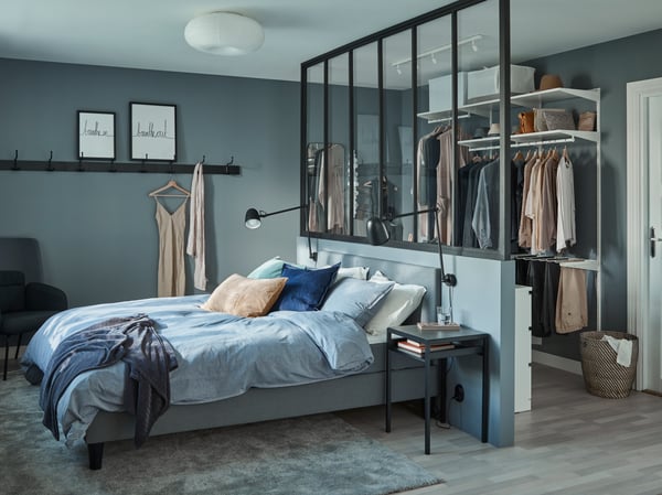 A modern bedroom setup with high pile STOENSE rug