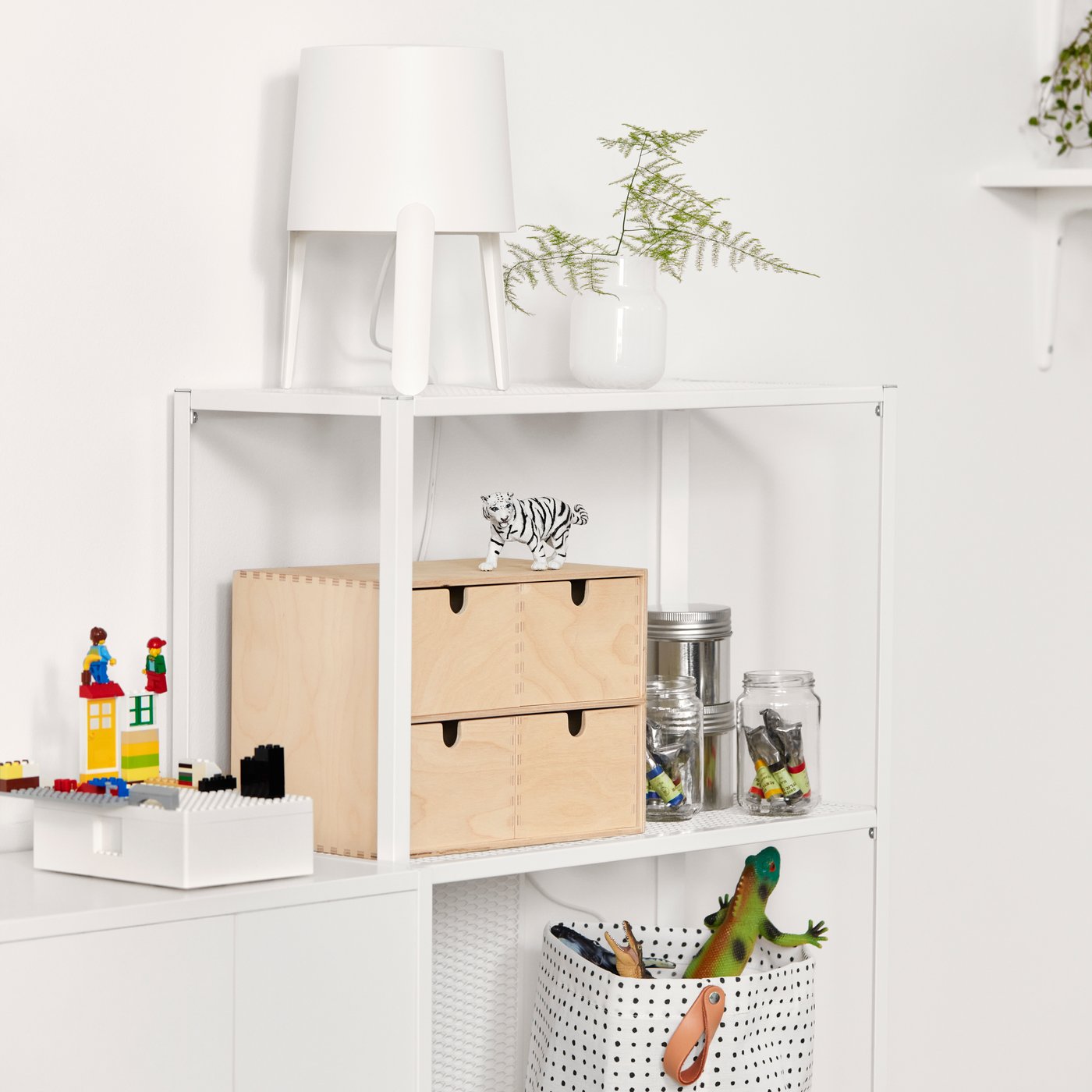 A birch plywood MOPPE mini chest of drawers in the childrens room
