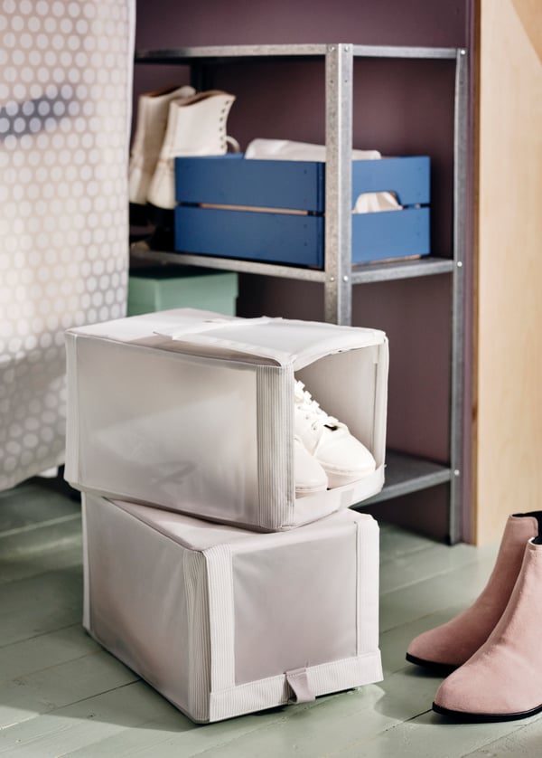 A white HEMMAFIXARE shoe box with a zip for storing footwear.