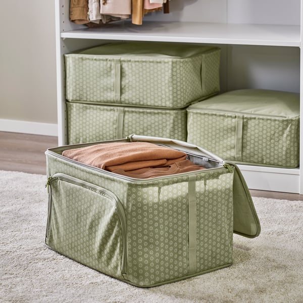 A flower/pale grey-green HEMMAFIXARE storage case