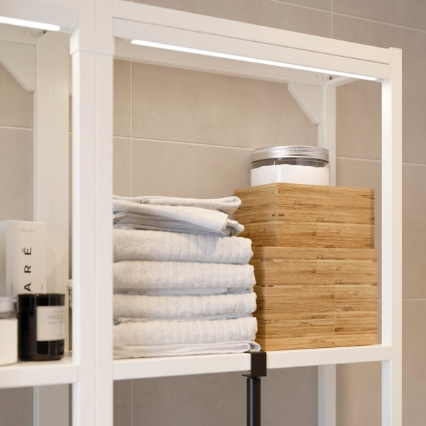 SILVERGLANS lighting strip installed under a wall shelf
