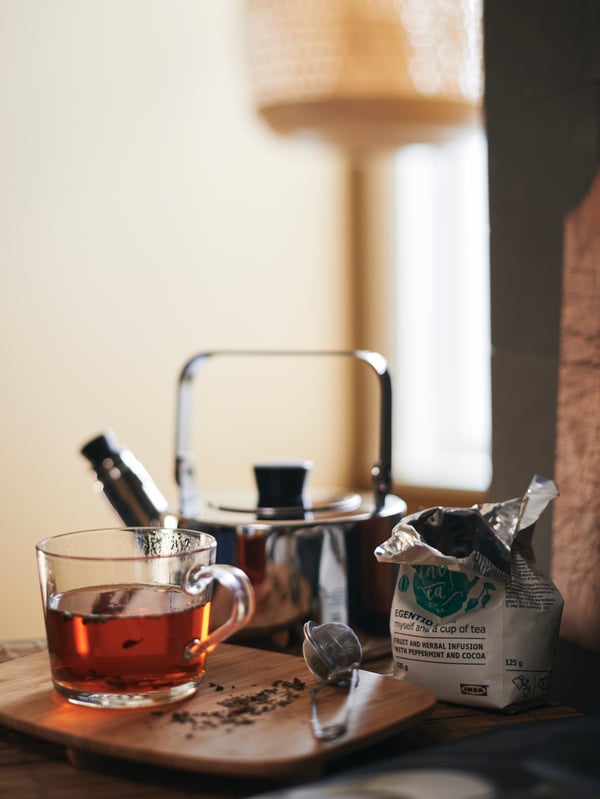 A calm morning tea moment featuring the METALLISK kettle and IKEA 365+ mug in clear glass.