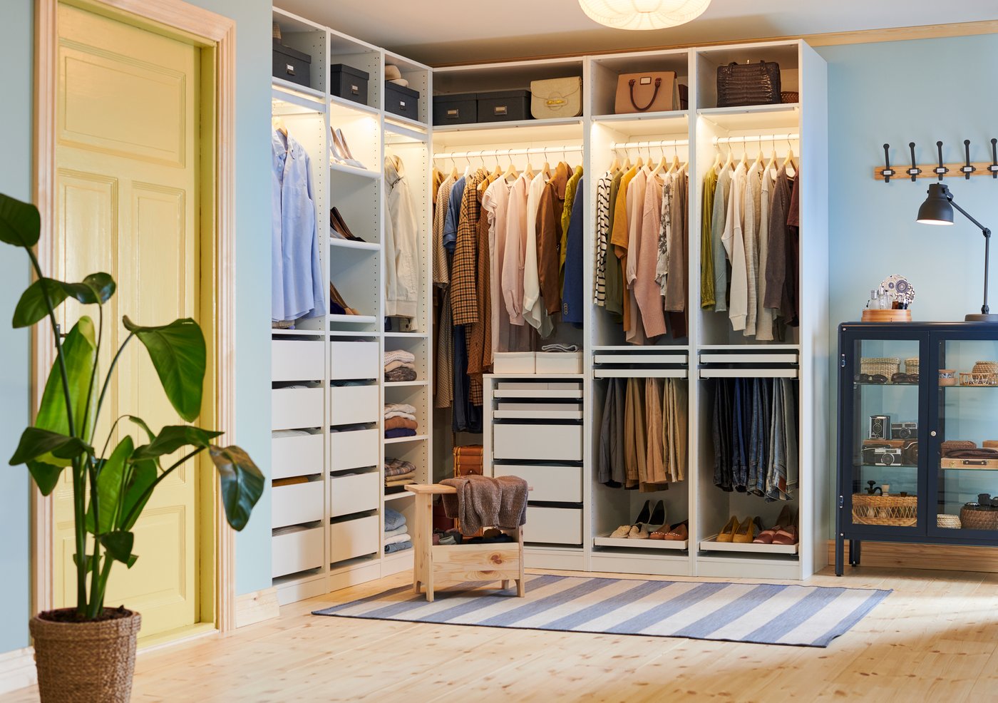 A white PAX corner wardrobe in the hallway