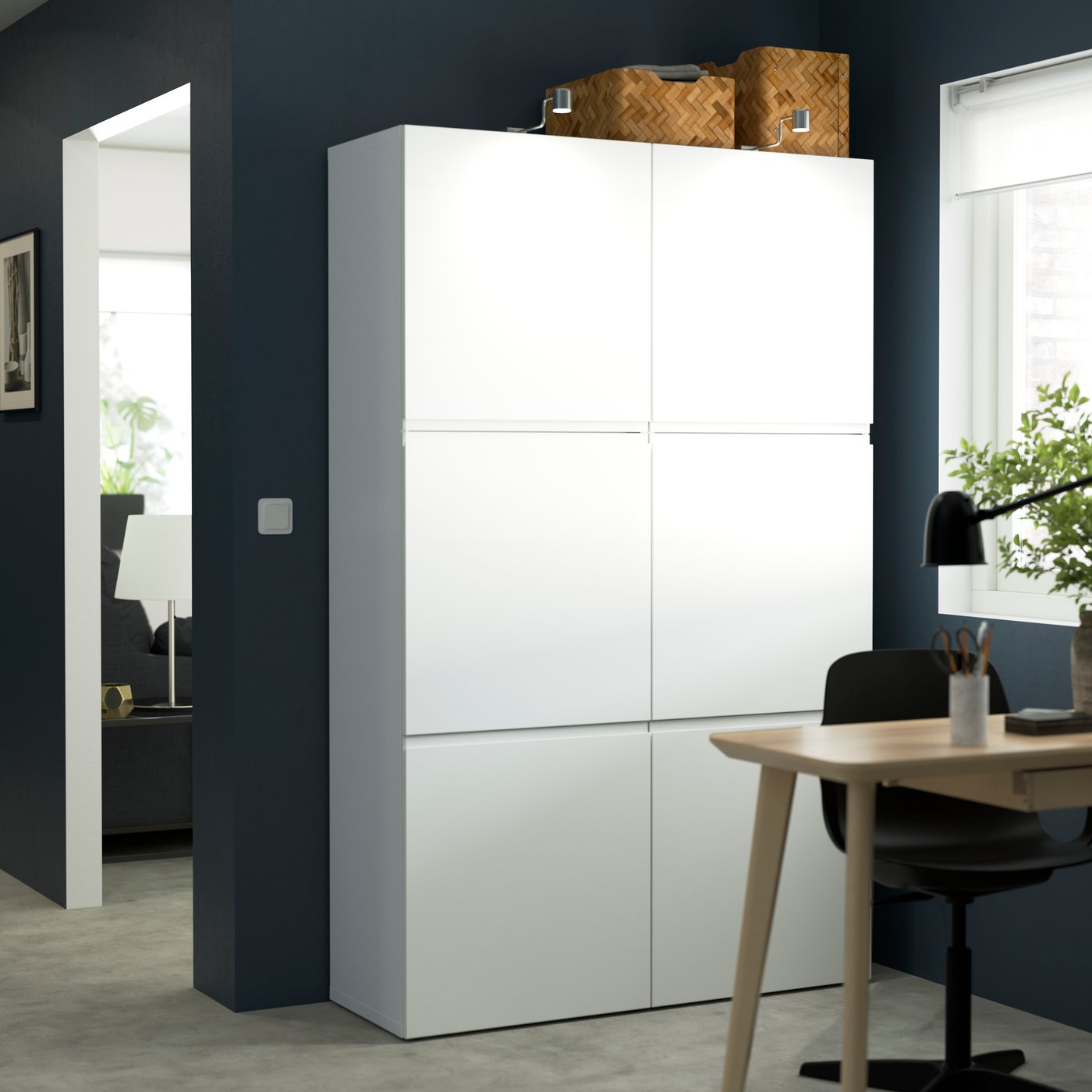 A white/Västerviken white BESTÅ storage combination with doors