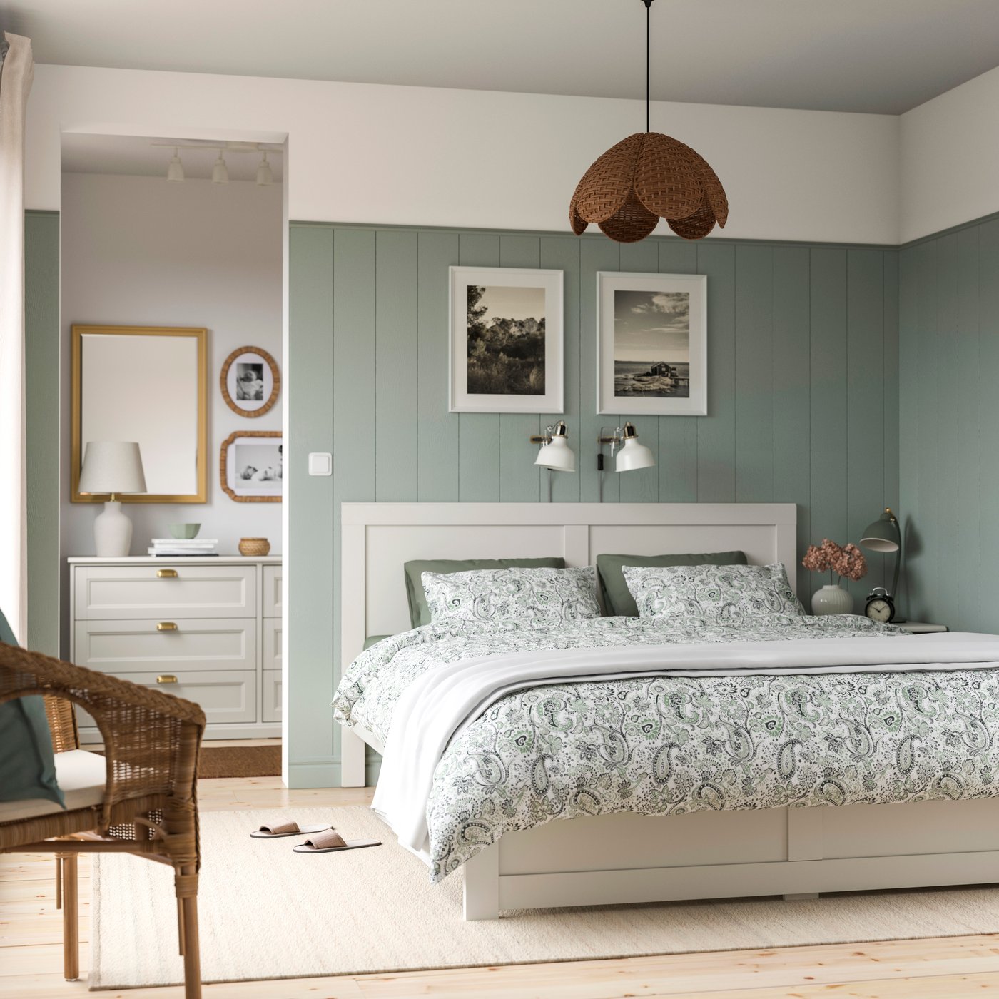 An off-white FÅGELFJÄLLET bed frame in the bedroom