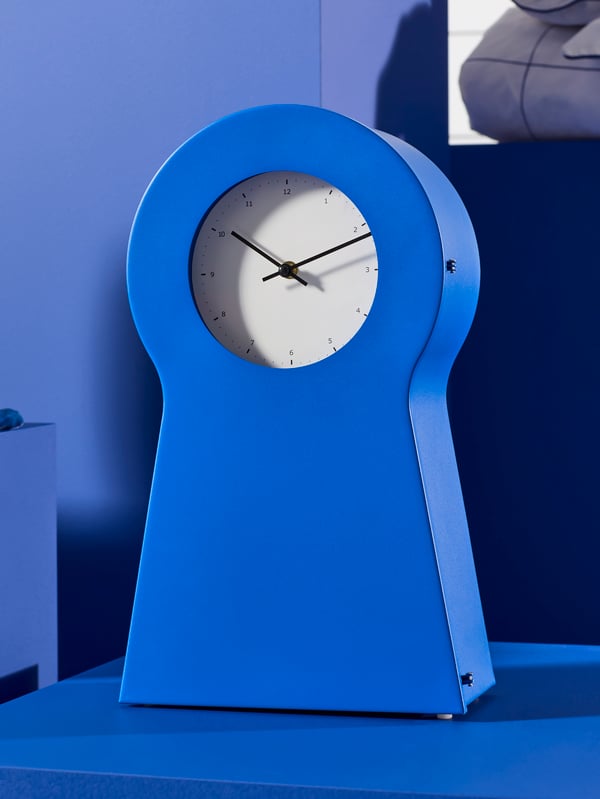 A blue IKEA PS 1995 clock