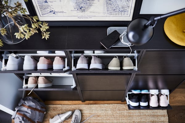 A black-brown BISSA shoe cabinet with 3 compartments in the hallway