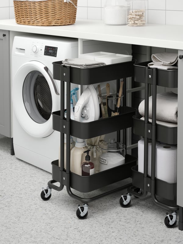 A black RÅSKOG trolley