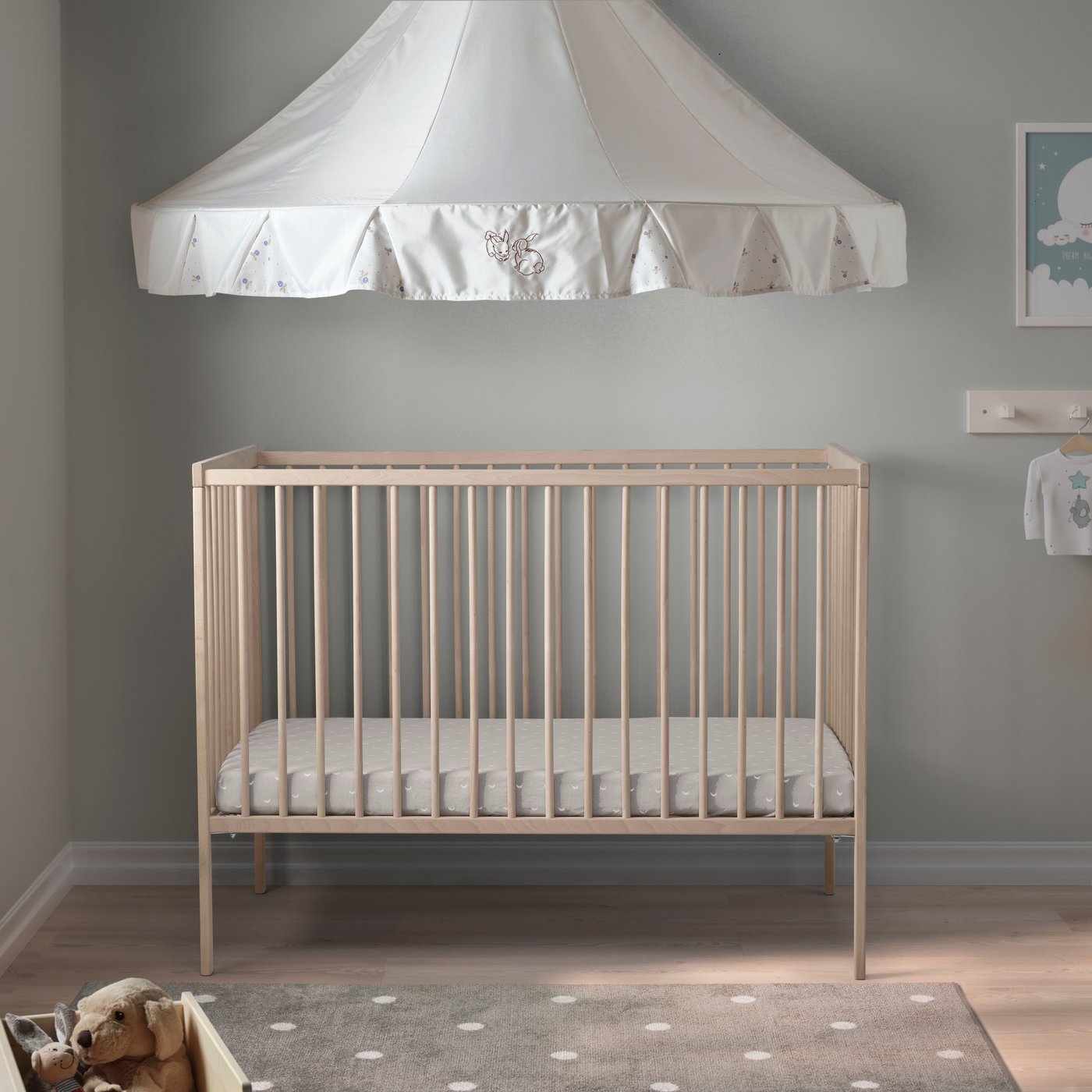 A beech SNIGLAR cot in the childrens room