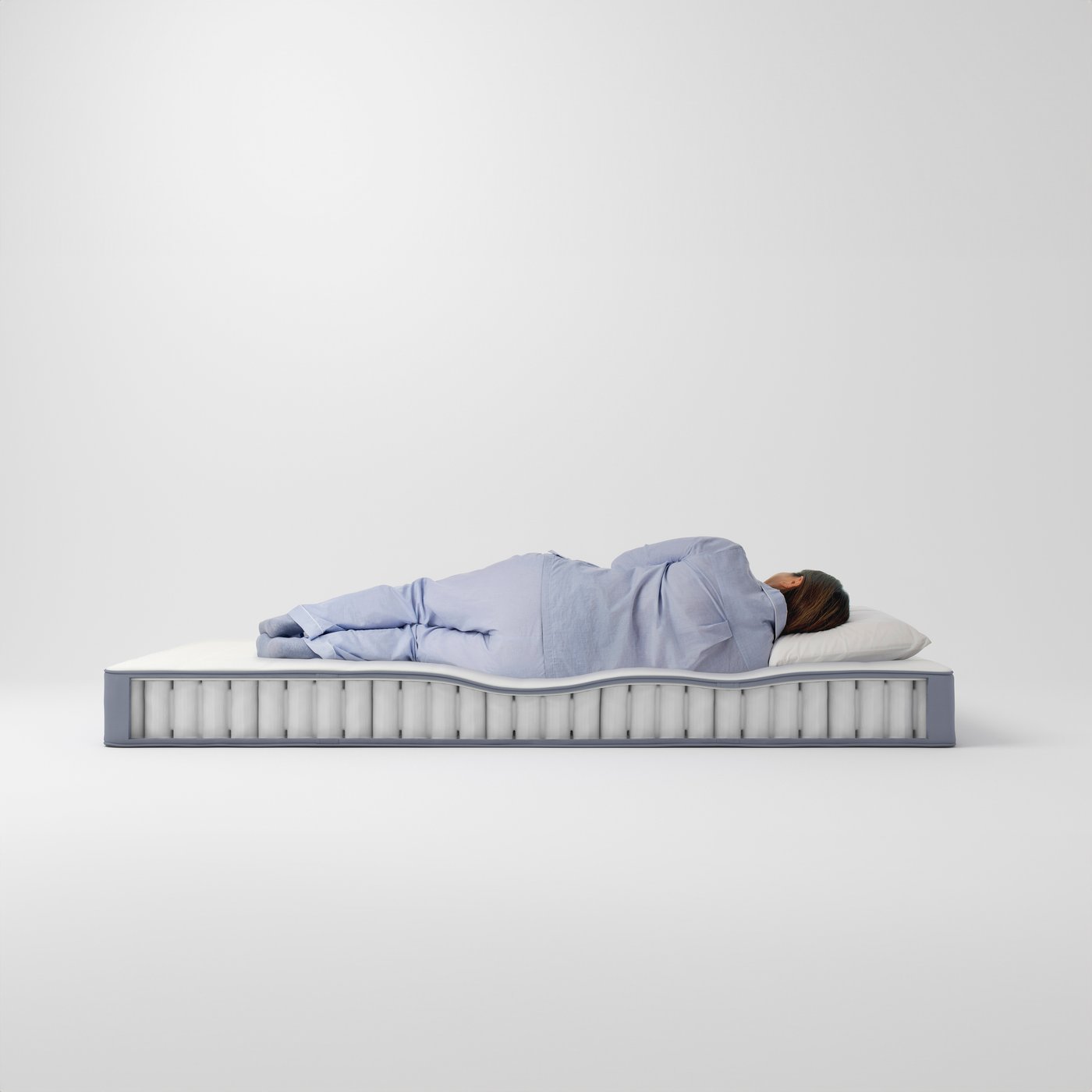 A firm/light blue VESTERÖY pocket sprung mattress