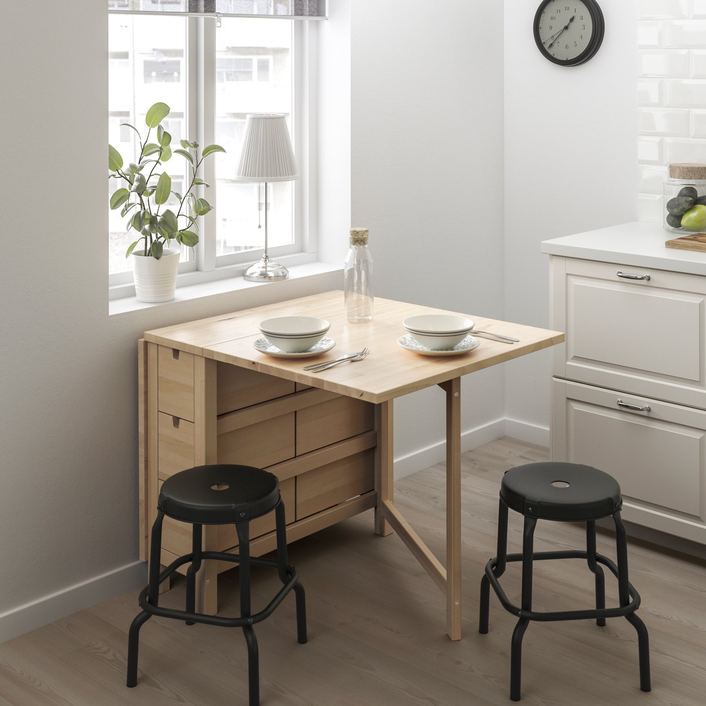 A birch/black NORDEN table and 2 stools