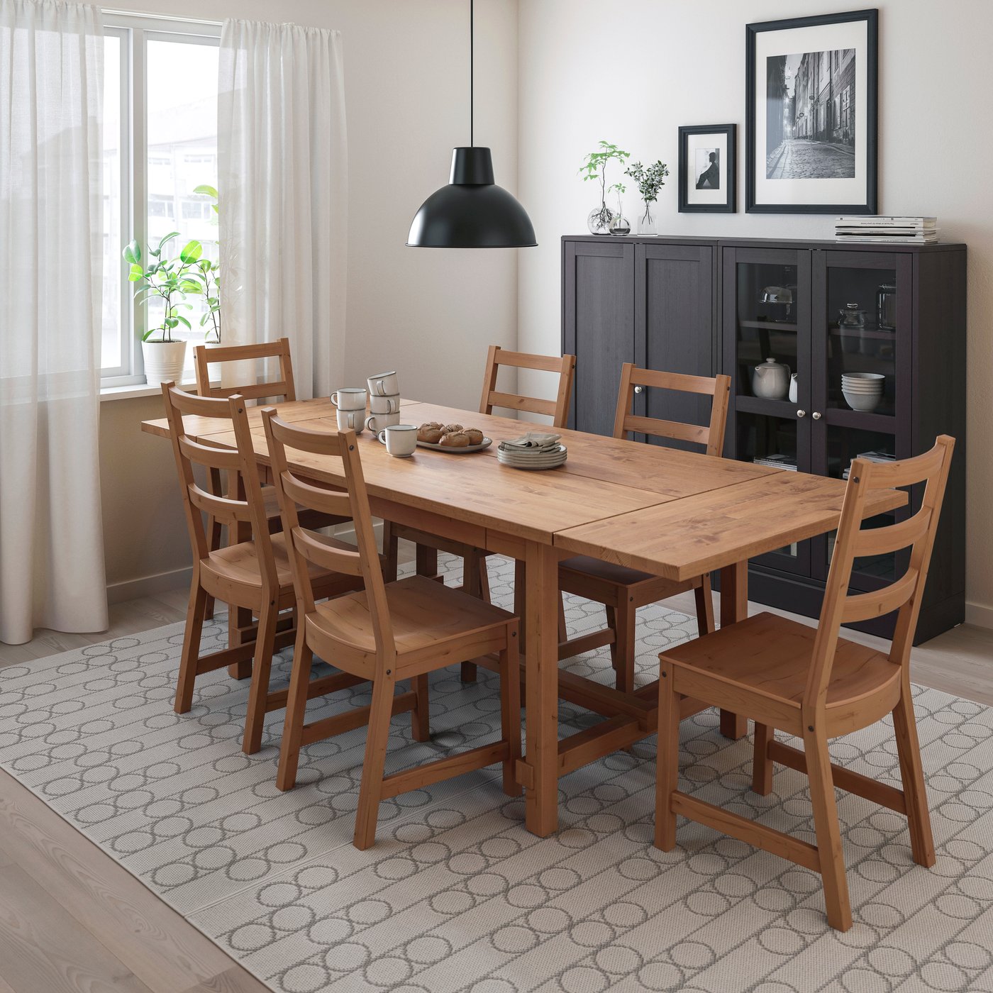 An antique stain/antique stain NORDVIKEN table and 6 chairs in the dining room
